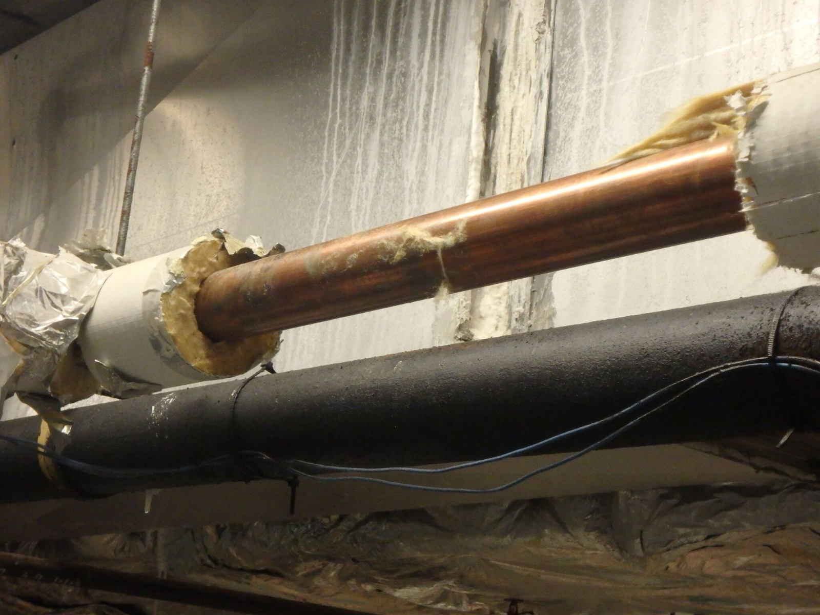 Figure 3. Insulation is fully removed for a section of the piping.